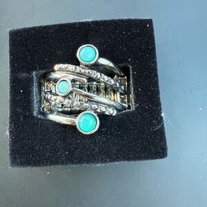 Elegant Silver Ring with Turquoise Highlights